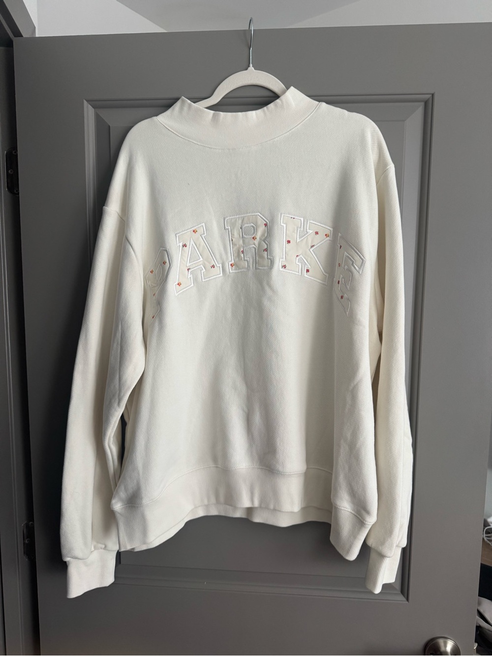 Parke NWOT Maggie & Emma Cream mock neck with floral lettering